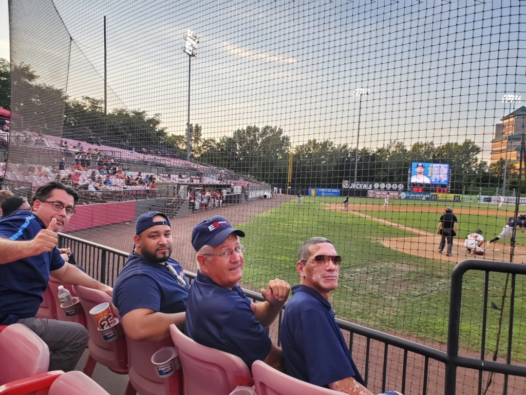 Jack Chambers (third from the left) with the boys of Eveready Express--kicking back at a Jersey Jackals baseball game.